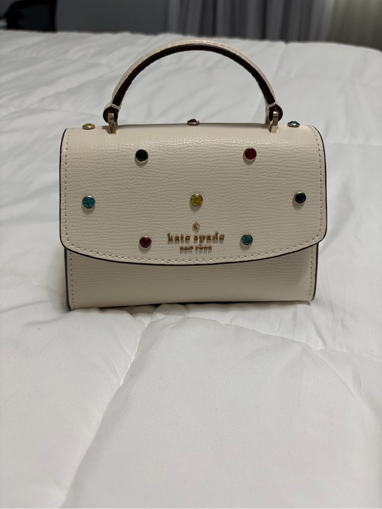 kate spade Handbags - Limited edition kate spade cream mini top-handle bag with multicolor studs